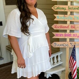 Short white dress. Great for wedding shower or bachelorette